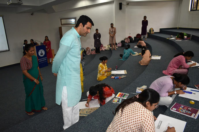 May be an image of 14 people, people studying, dais and text